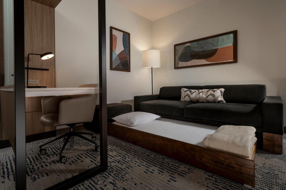 Queen Suite with Two Queen Beds and Sofa Bed interior